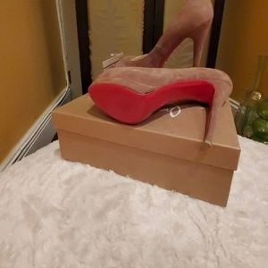 CHRISTIAN LOUBOUTIN RED BOTTOM